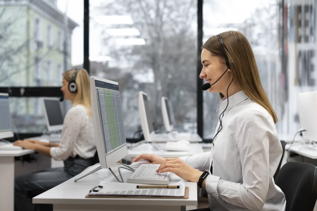 Corporate secretarial team providing ASIC compliance support, drafting board resolutions and maintaining company records in a modern office setting.